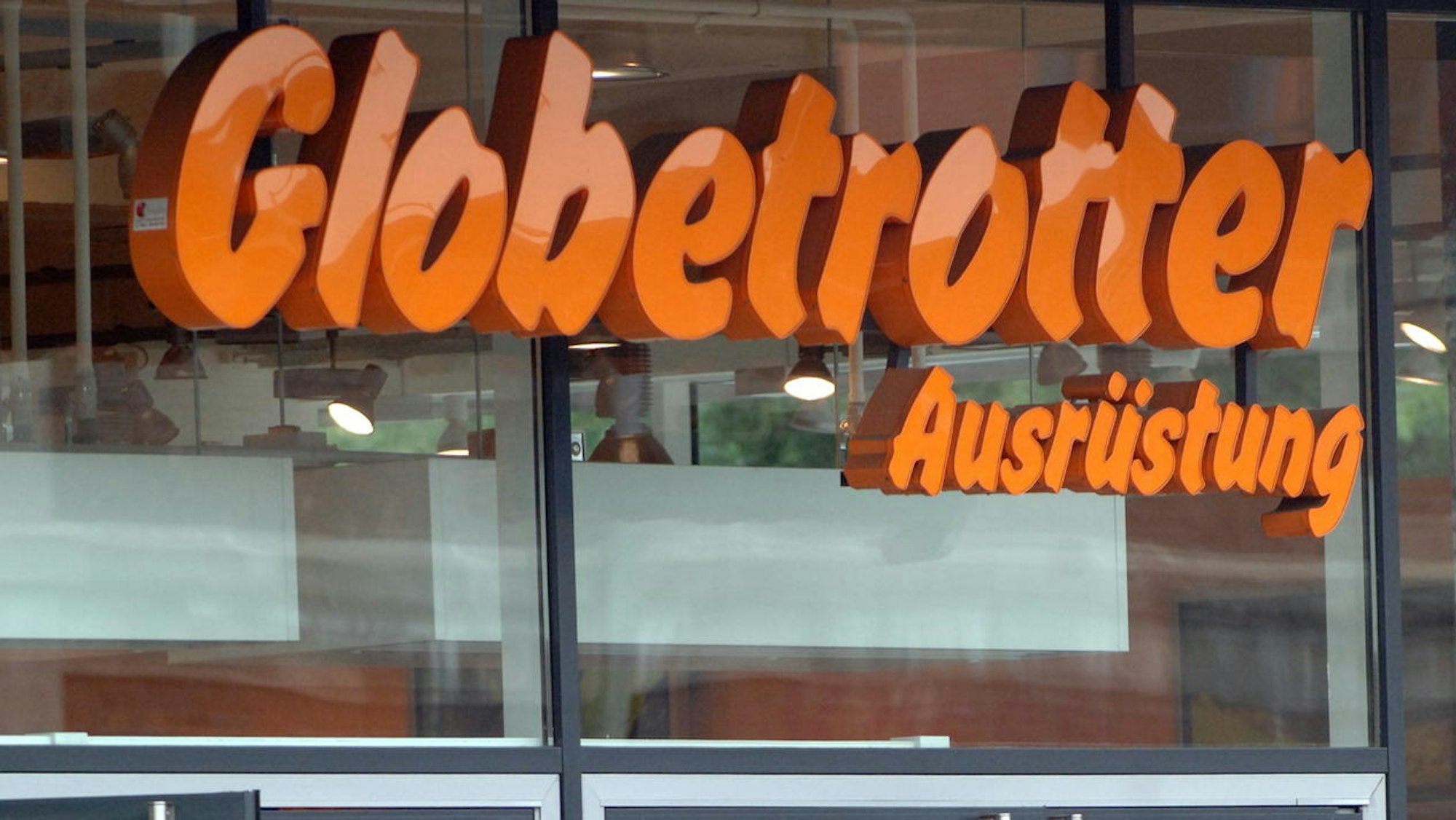 Globetrotter-Schild an einem Laden