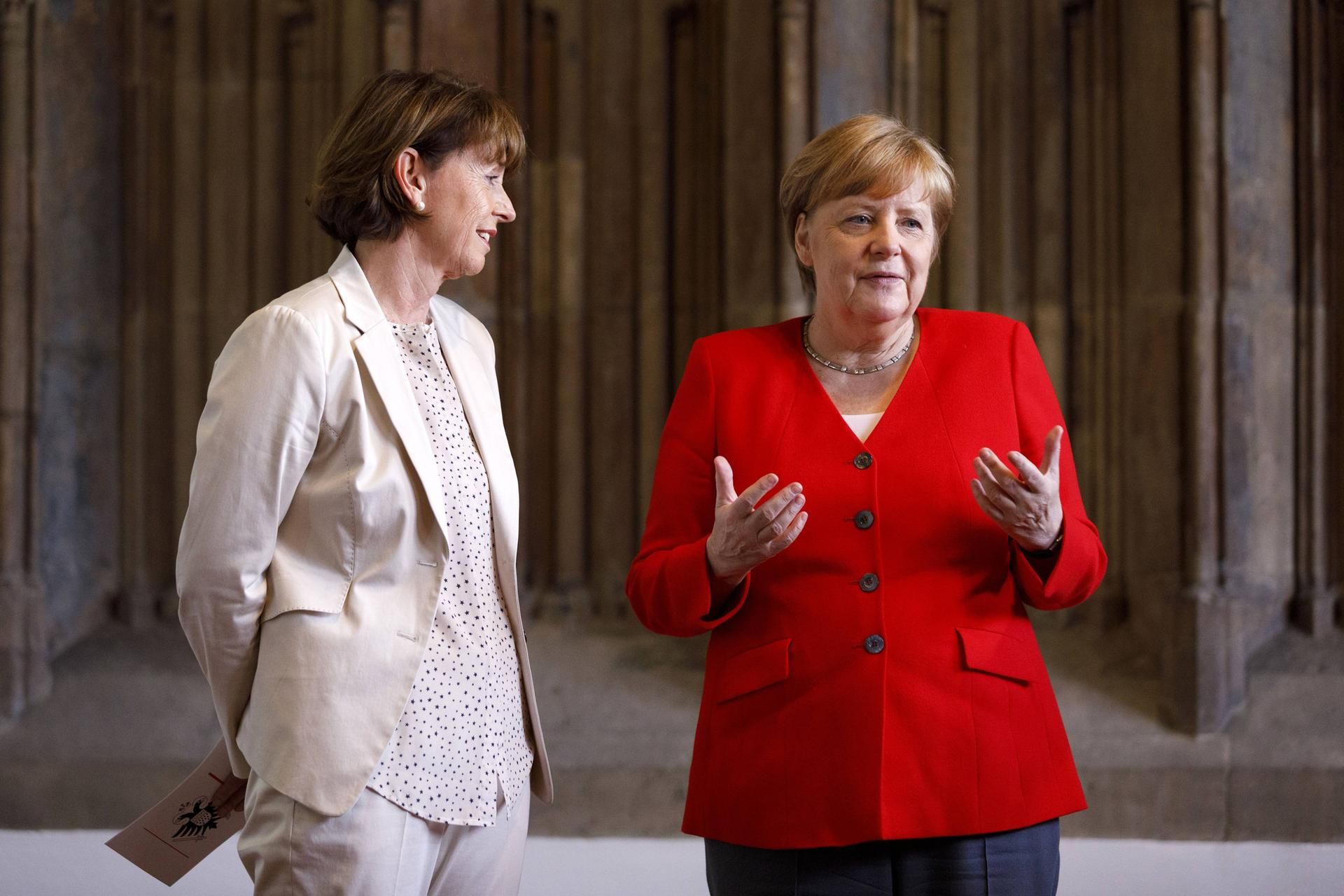 Reker und Merkel