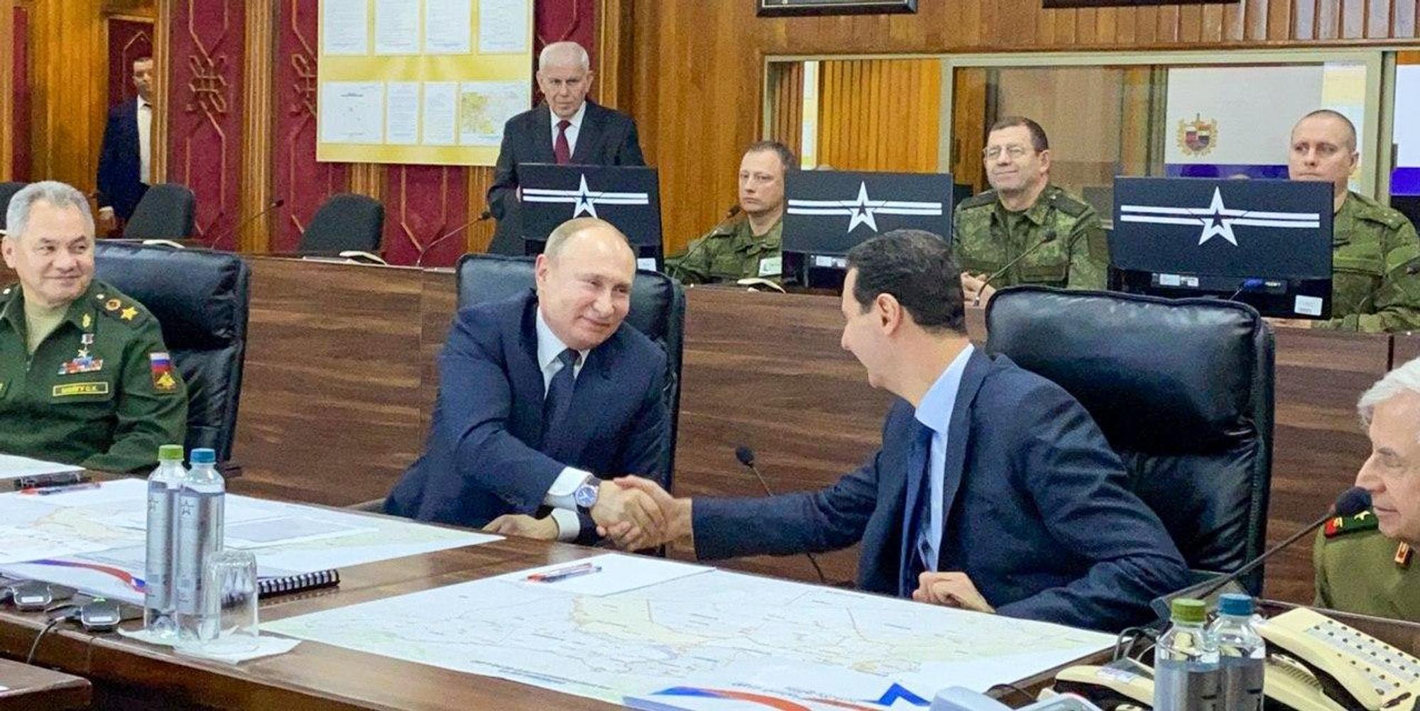 Putin Assad afp