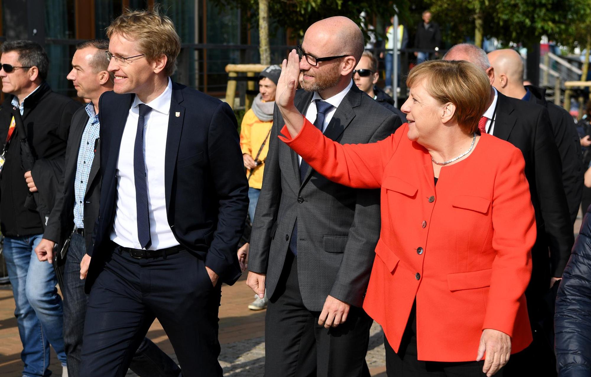 Gesten Merkel Winken