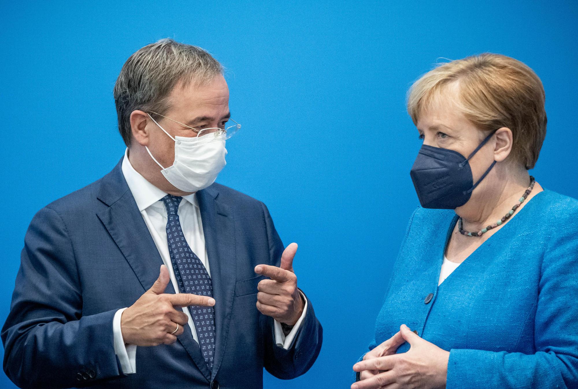 Laschet und Merkel