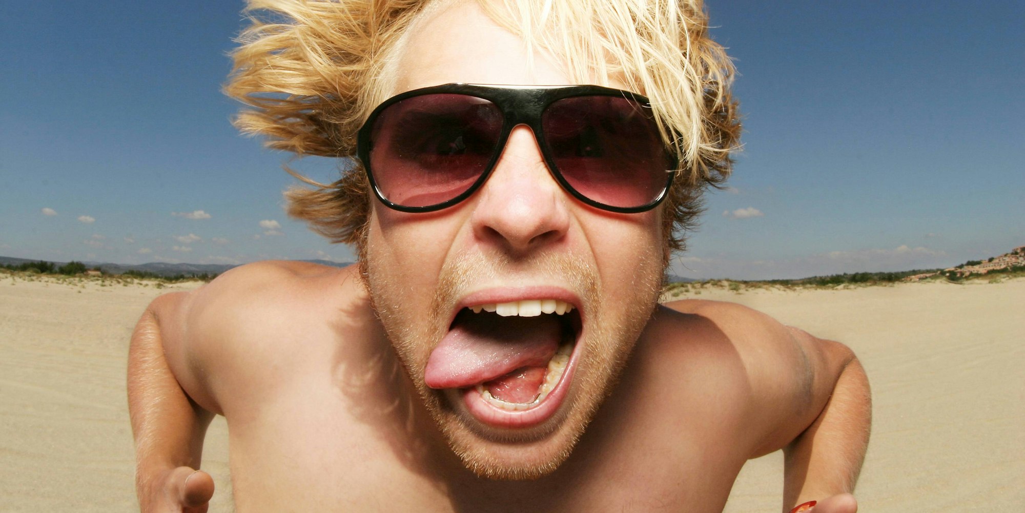 urlauber_mann_verrueckt_imago